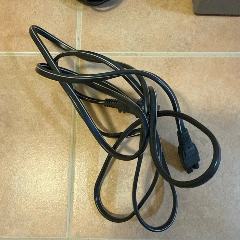 Sony Gray PlayStation Console with Two Wired Gray Controllers